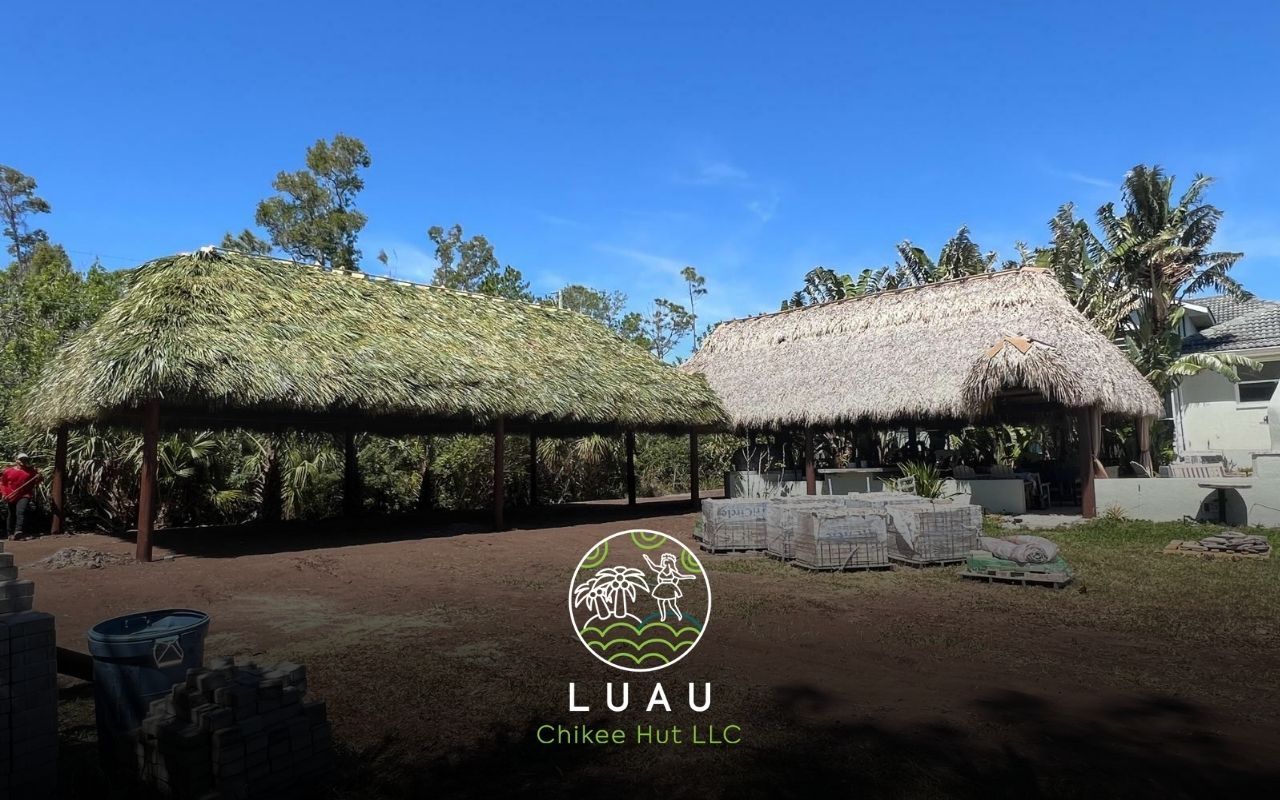 Modern tiki hut under construction using bamboo and thatch